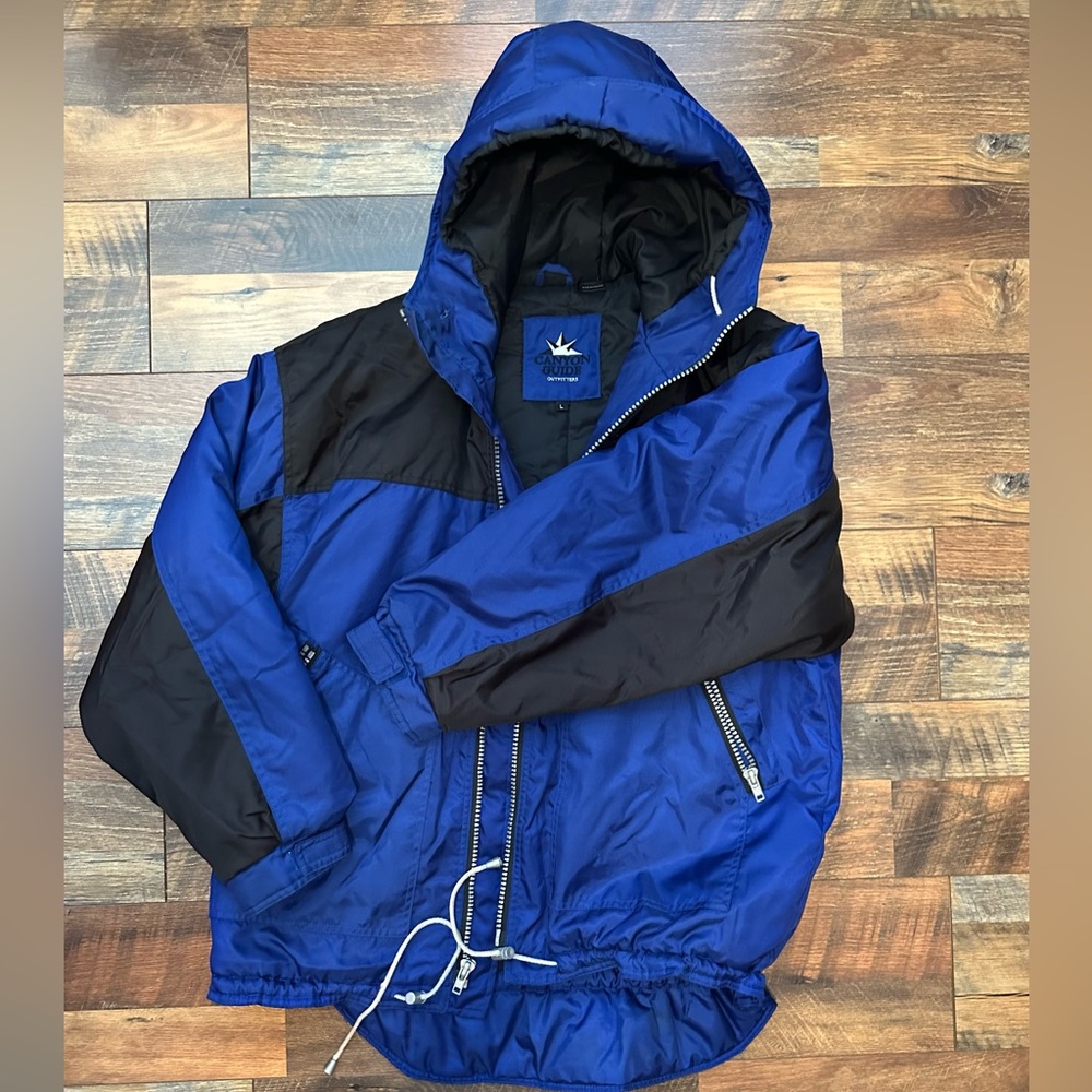 Blue and black canon guide outfitters winter jacket